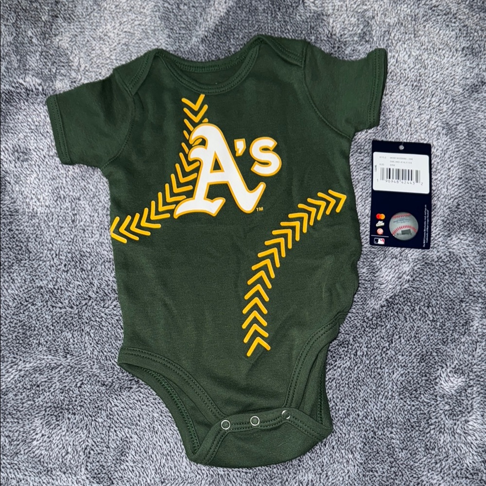 Genuine Merchandise Green Baby Onesie